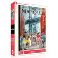 A 1000-piece jigsaw puzzle box of a The New Yorker cover, featuring a colorful illustration of a city street scene with pedestrians, a yellow cab, and a bridge in the background. The box is shown at a three-quarter angle on a clean white background.