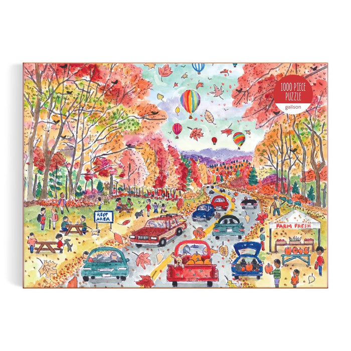 Colorful puzzle box with an autumn scene featuring trees, cars, and people.