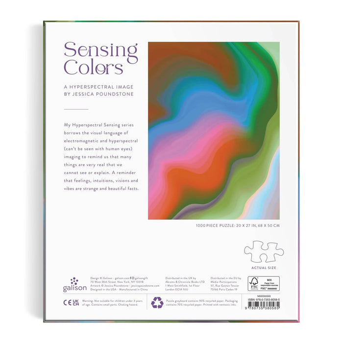 The product packaging for the 'Sensing Colors' 1000-piece puzzle by Jessica Poundstone, featuring a vibrant, abstract fluid art design with swirling waves of green, blue, pink, orange, and purple. Back view with description and other info shown on a plain white background.