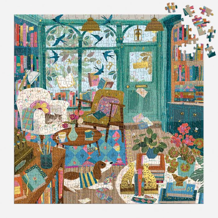 Colorful puzzle of a cozy bookshop with books, chairs, a cat, and a dog.