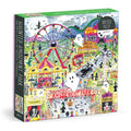 A 500-piece jigsaw puzzle box titled 'Haunted Amusement Park' by Galison, featuring a colorful, whimsical illustration of a Halloween-themed fairground with a ferris wheel, carousel, ghosts, and playful figures.