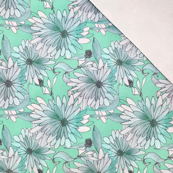 This printed WPCotton features daisy flowers in hues of mint.