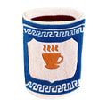 A tufted accent rug shaped like a cup with the Anthora coffee cup design, including a blue and white Greek key pattern and a central shield design featuring an orange coffee cup with steam, shown on a plain white background.