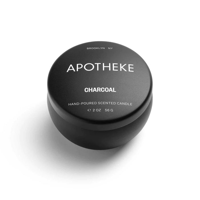 Apotheke Charcoal scented soy wax blend candle in mini black tin with lid.