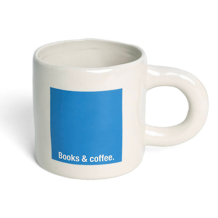White mug with blue square and 'Books & coffee.' text on a white background.