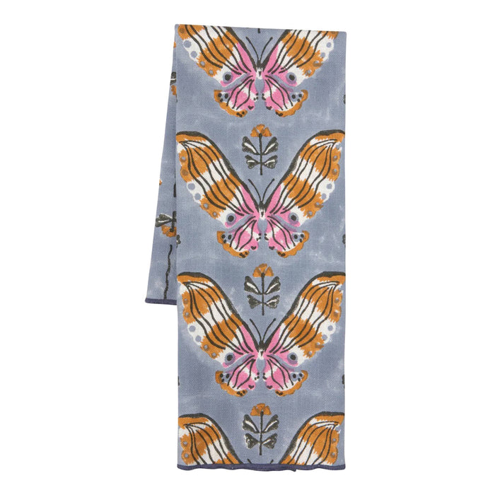 Butterfly patterned towel, folded, on a white background.