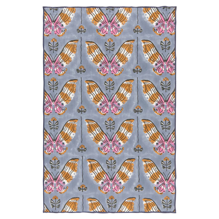 Butterfly patterned towel, flat, on a white background.