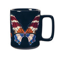 Navy mug with a colorful butterfly design, handle on the right, on a white background.