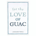 Front cover of a white book box containing avocado tools with "for the love of guac" in blue, on a white background.