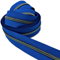 This zipper tape is in a standard bright shade of blue.