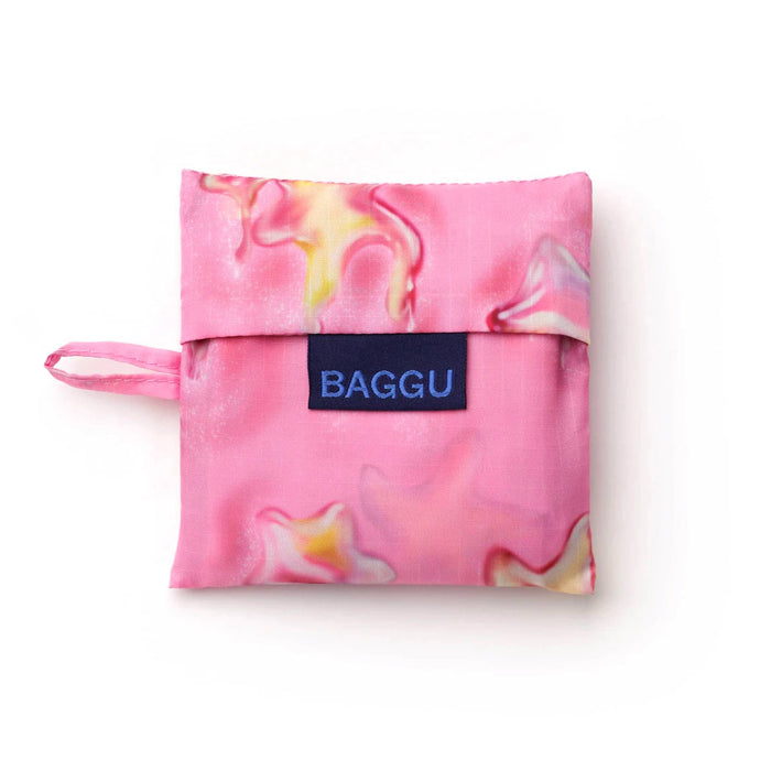 Baby Baggu reusable shopping bag with a dancing starfish design in matching pouch on a white background.