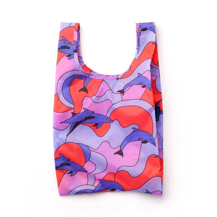 Baby Baggu reusable shopping bag with colorful dolphin design on a white background.
