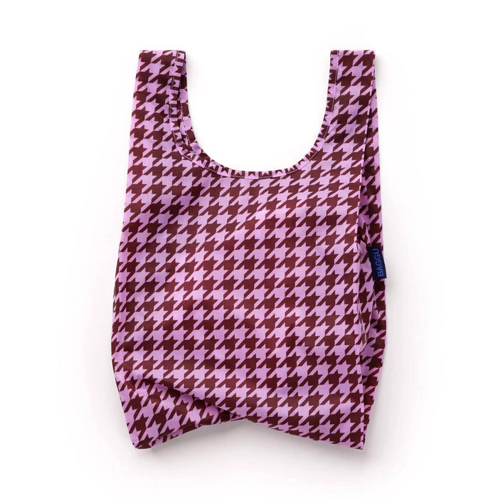 A reusable ripstop nylon tote bag with a pink and brown houndstooth pattern, shown against a plain white background.