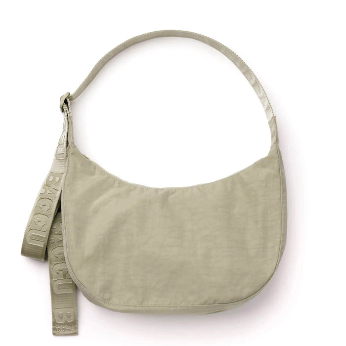 Baggu Celadon medium ripstop nylon crescent bag, front view.