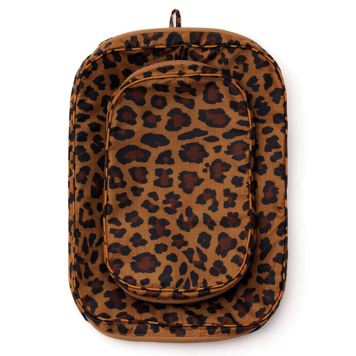 Set of 2 recycled nylon packing cubes with leopard print, flat and stacked, on a white background.