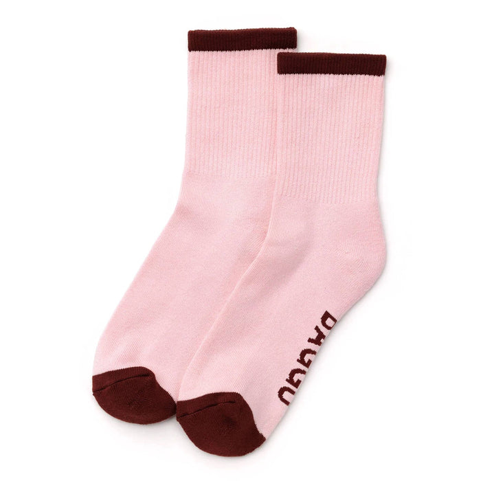 Pink socks with burgundy accents on a white background.