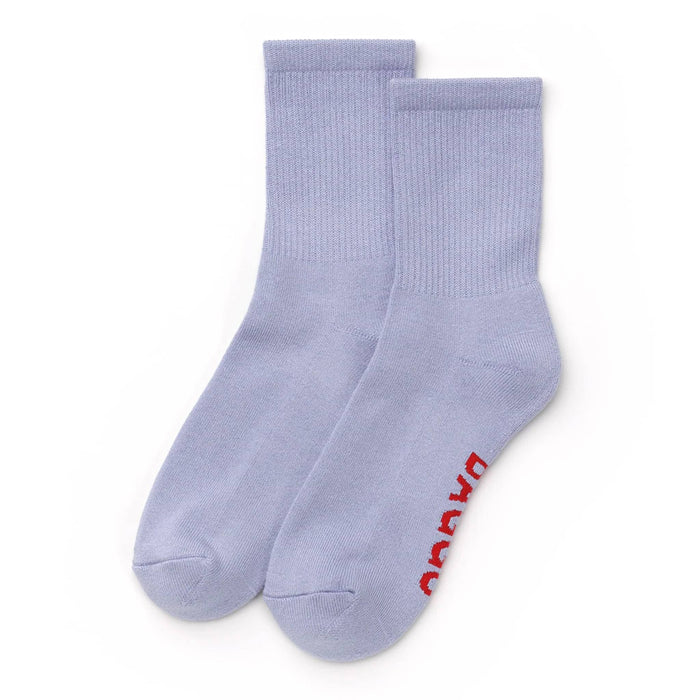 Pair of light blue socks on a white background.
