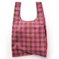 A reusable recycled ripstop nylon shopping bag with a pink and lime green tartan pattern, shown against a plain white background.
