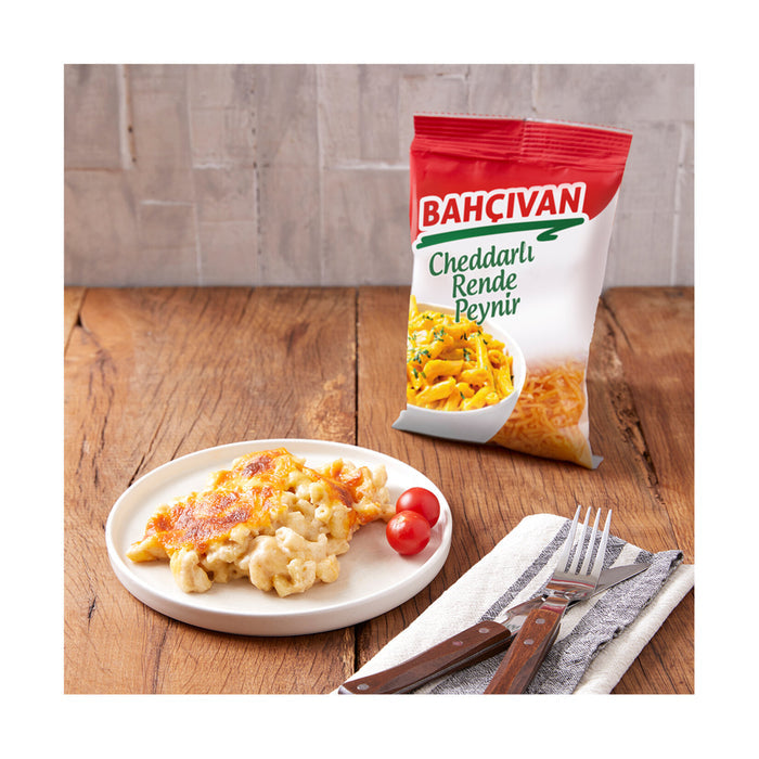 Bahcivan Cheddar Shredded Cheese brings smooth texture and rich cheddar flavor to your everyday meals.