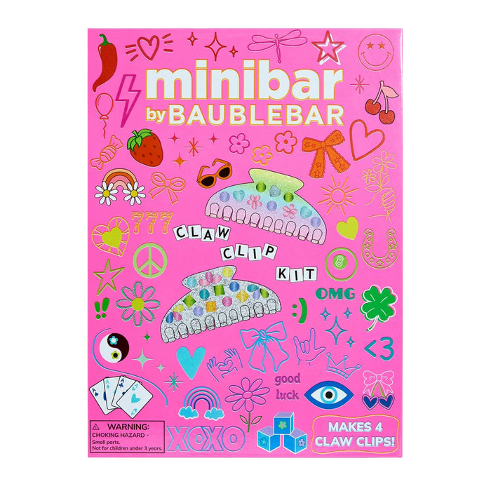 Pink packaging of a claw clip kit by Baublebar with various designs and text on a white background.