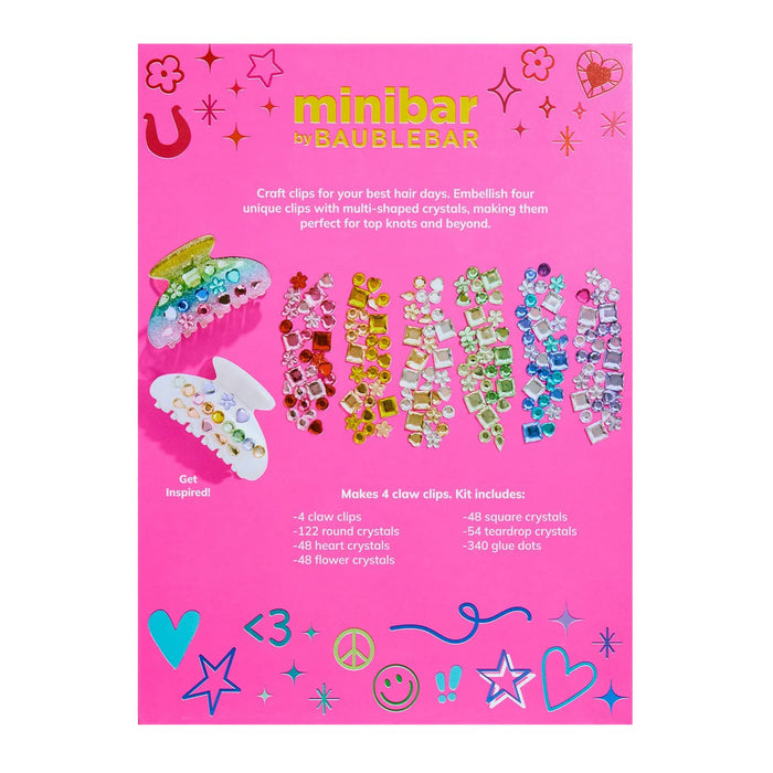 Back of pink packaging for the minibar claw hair clip craft kit showing contents, on a white background.