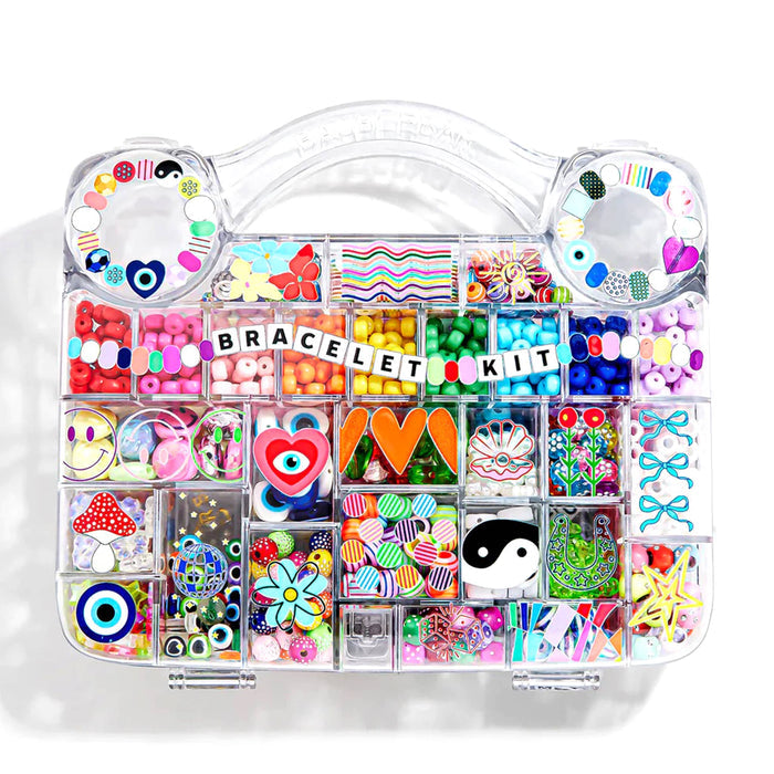Bracelet making kit with various colorful beads and charms in a clear organizer case, top view, on a white background.
