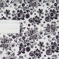 This printed WPC-Lite is of a variety of black flowers on a white background.