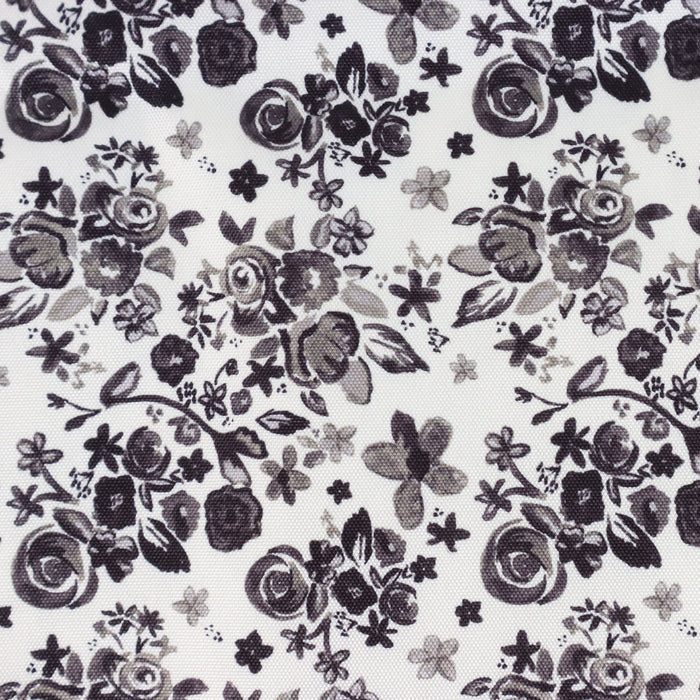 This printed WPC-Lite is of a variety of black flowers on a white background.