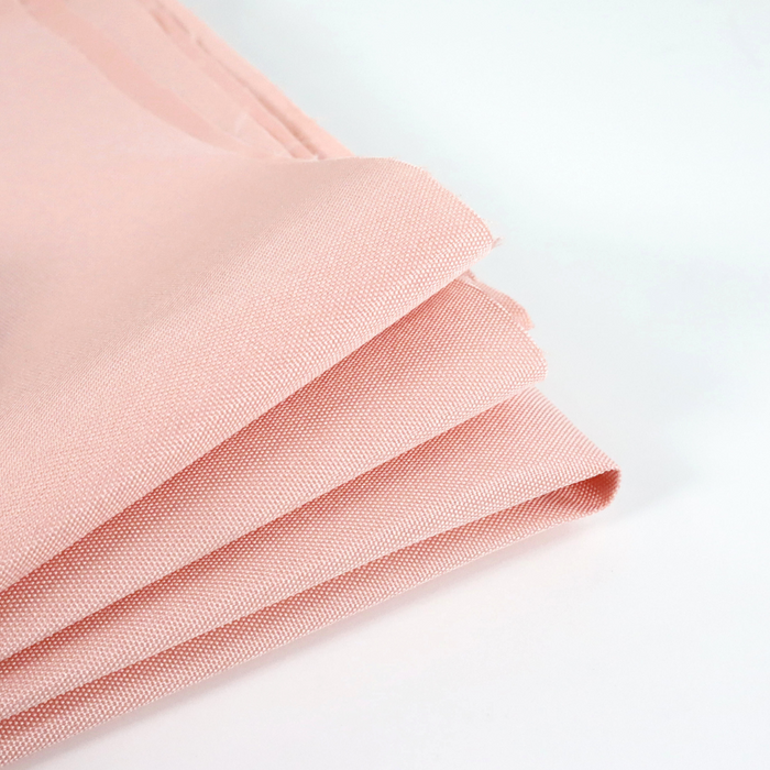 This WPC-Lite solid is in a pinky-peach shade. This photo shows the fabric folded.