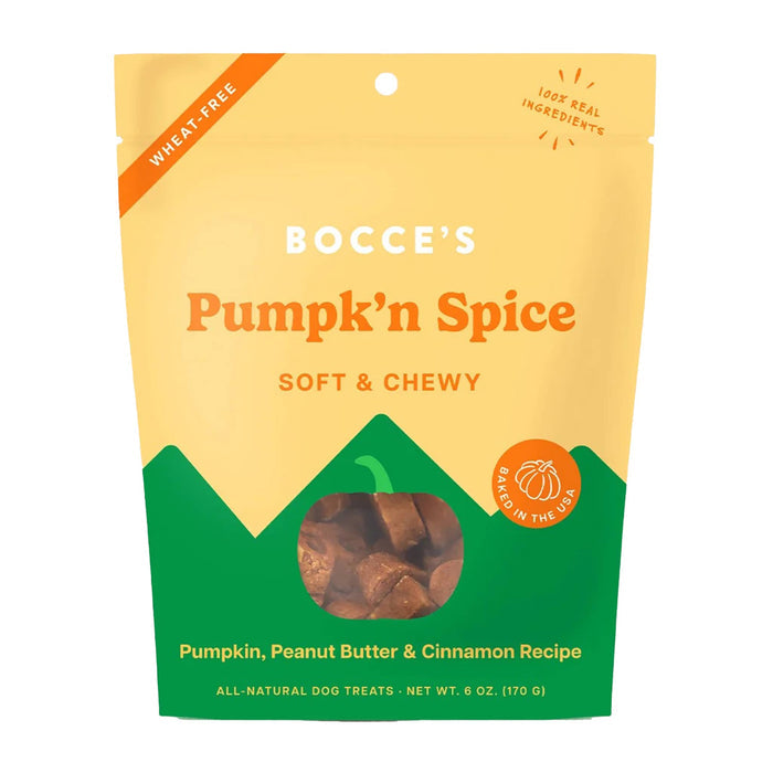 Pumpk'n spice soft & chewy dog treats in golden yellow resealable pouch front view with an illustration of green hills with green trees and a pumpkin shaped cutout showing treats inside.