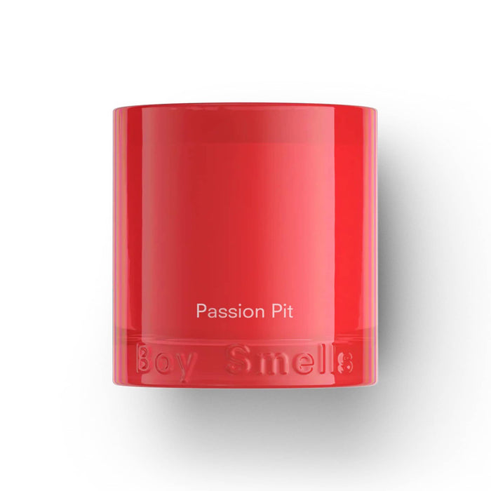 Boy Smells Passion Pit scented 9 ounce Essentials candle in red glass vessel, front view.