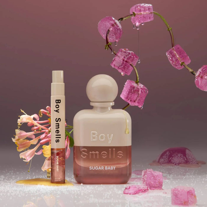 Boy Smells Sugar Baby scented eau de parfum 50ml bottle with 10ml travel spray, pink sugar cubes melting in the background.