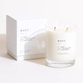 MAUI scented double wick candle and packaging on a white background.