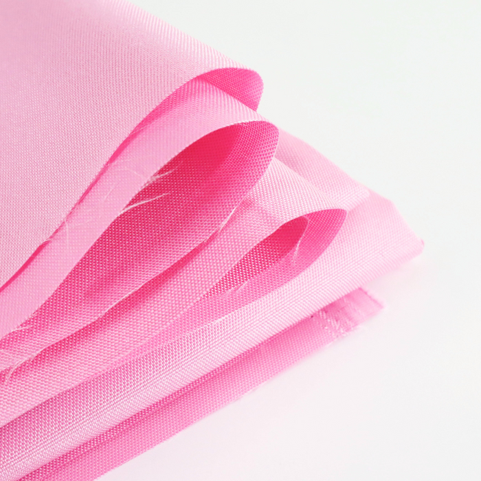 This WPC-Lite solid is in a bright cool toned pink. This photo shows the fabric folded.