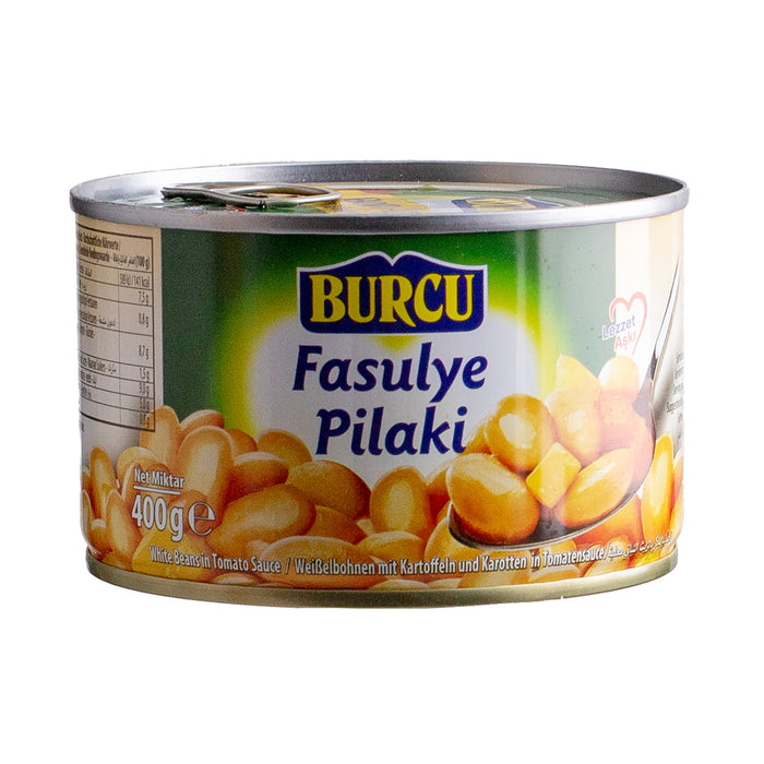 Burcu Fasulye Pilaki is a classic Turkish-style white bean dish cooked in a light olive oil base with vegetables and traditional seasonings.
