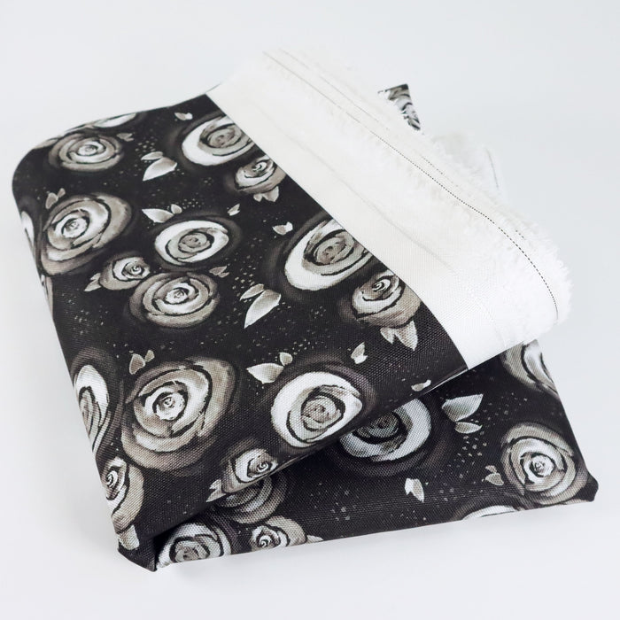 This printed WPC-Lite is of watercolor roses in black and white. This photo shows the fabric folded.