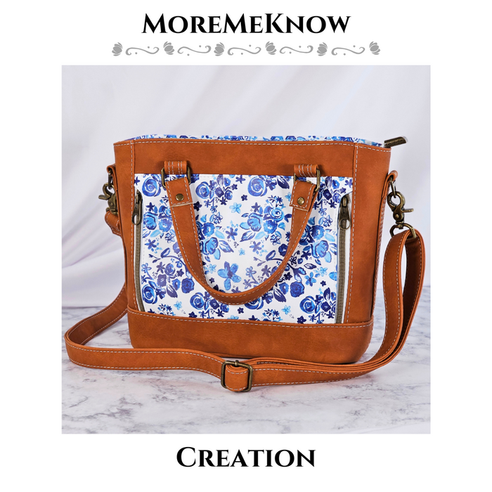 This photo shows a purse made with this printed vinyl and a brown vinyl.