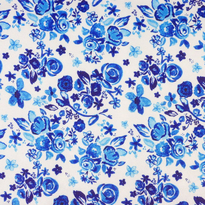 This printed WPC-Lite is of a variety of blue flowers on a white background.