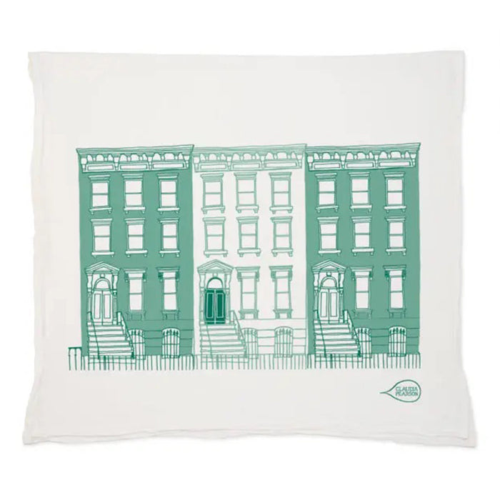 off-white flour sack cotton towel with a row of 3 classic brownstones with stoops in a blue green color palette