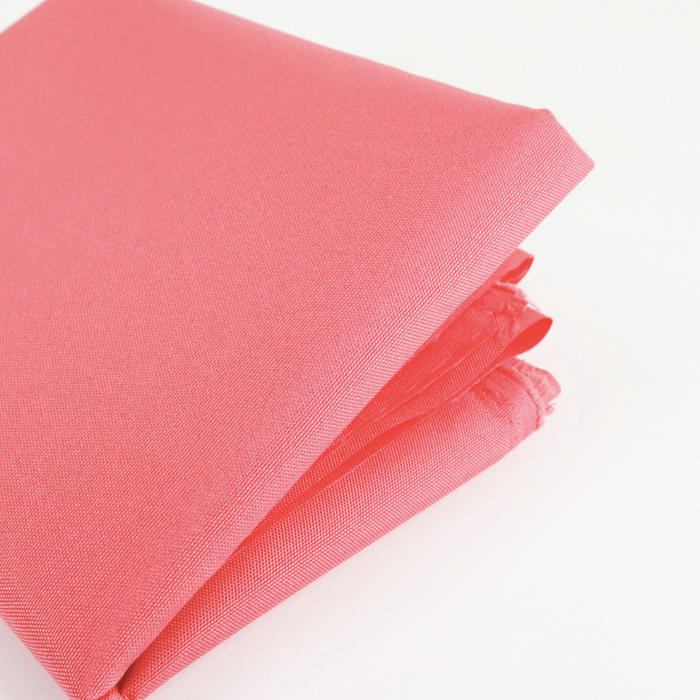 This WPC-Lite is in a pale, yet saturated, red. This photo shows the fabric folded.