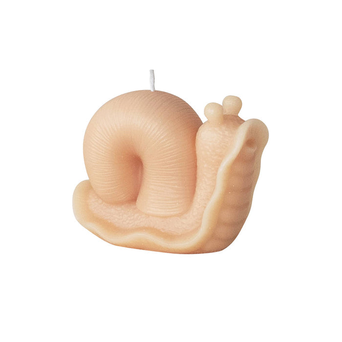 Snail-shaped candle on a white background.