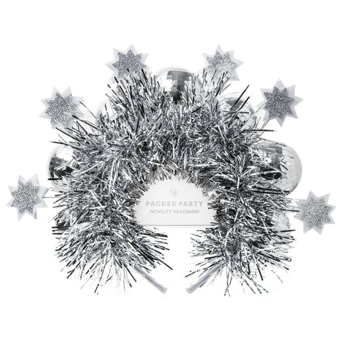 A silver tinsel novelty headband with attached silver star felt and silver disco ball ornaments with a white paper label reading 'PACKED PARTY NOVELTY HEADBAND' on a plain white background.