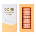 chez gagne done parenting today orange and vanilla scented shower steamers in slipcase packaging with white and orange front and "done parenting today" in gold foil print