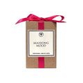 Ella B Candles scented candle in kraft box with a hot pink satin bow and "mahjong mood" on the label, on a white background.