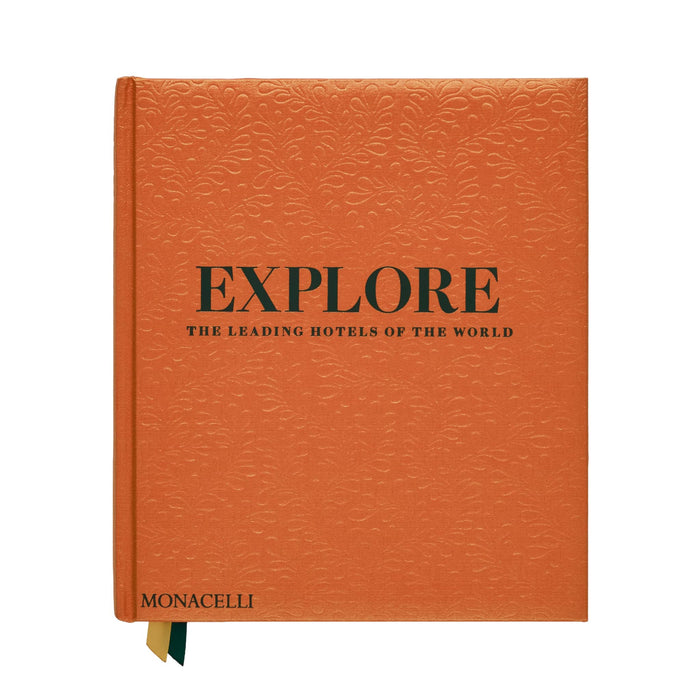 Orange book titled 'EXPLORE: The Leading Hotels of the World' on a white background.