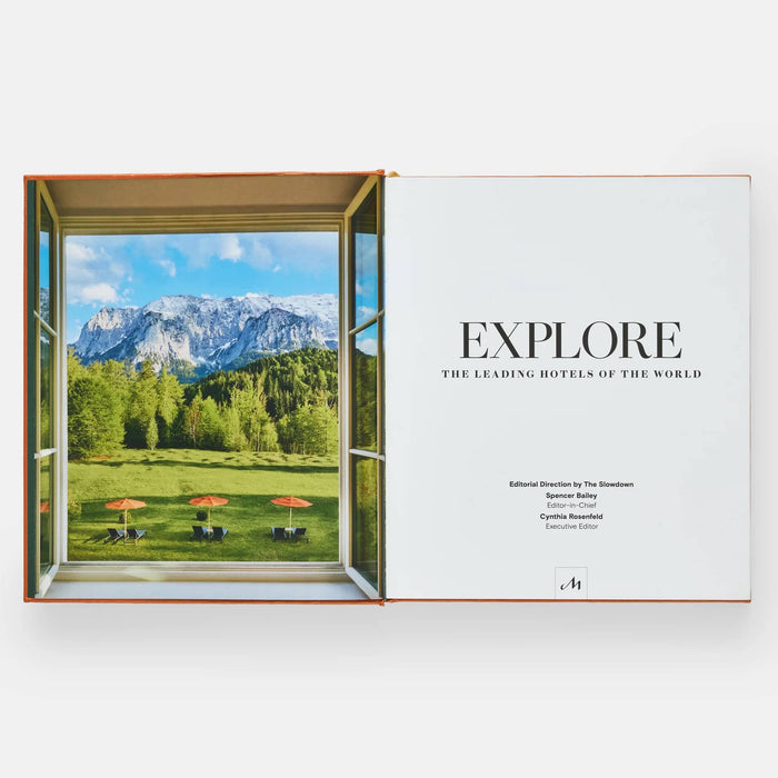 Book titled 'EXPLORE The Leading Hotels of the World' with a scenic illustration on the title page.