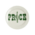 White stoneware plate with green cactus design and text, overhead view, on a white background.