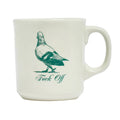 White mug with green pigeon illustration and text, front view, on a white background.