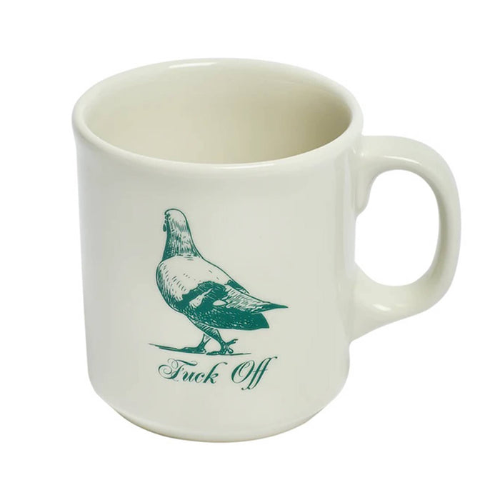 White mug with green pigeon illustration and text, front slightly overhead view, on a white background.