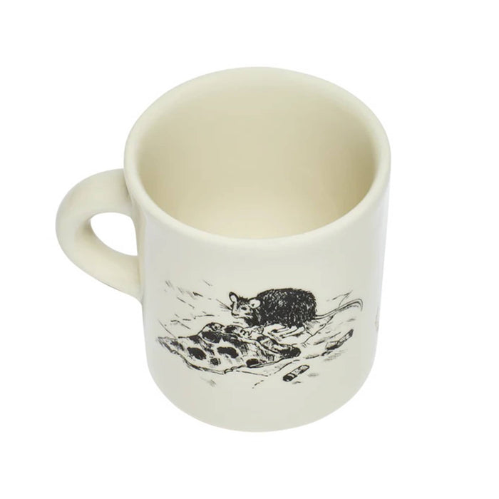 White mug with an illustration in black of a rat with a slice of pizza, overhead view, on a white background.
